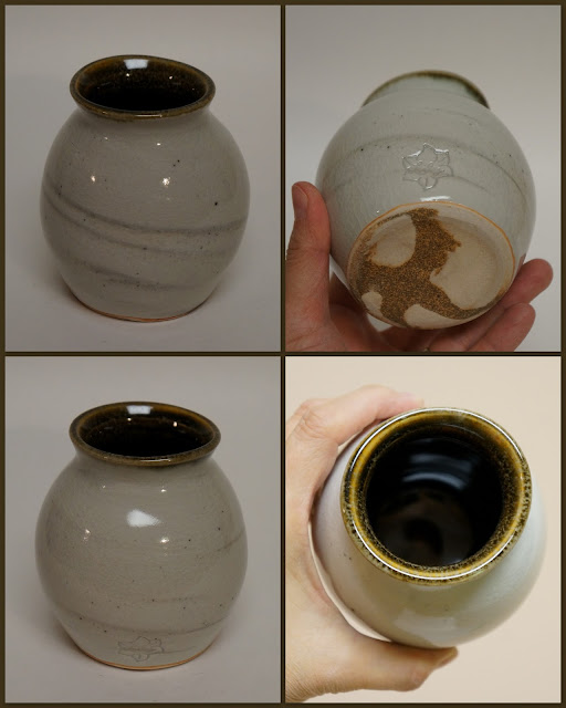 Ceramic pottery vase / vessel with marbled design.