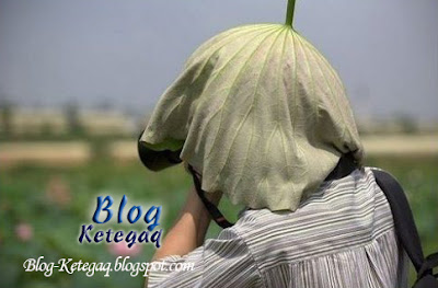 Telatah lucu orang Asia menangkap gambar