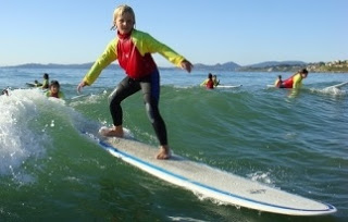 Surf Foto de niño surfista con su tabla