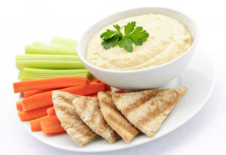 Hummus with pita chips and vegetables