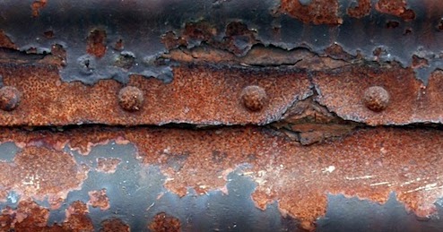 Does Acid make steel rust faster?