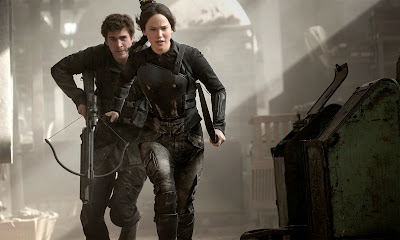 Liam Hemsworth and Jennifer Lawrence in The Hunger Games Mockingjay Part 1