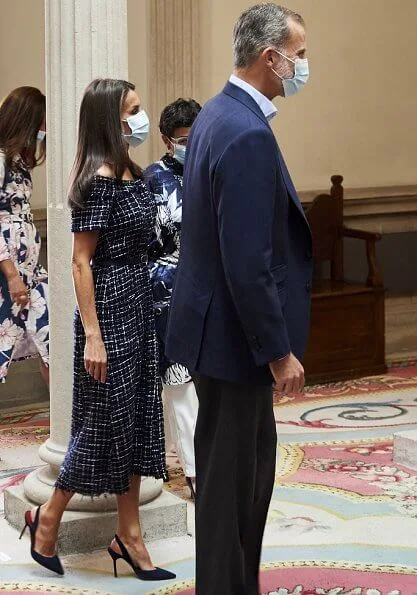 Queen Letizia wore Zara tweed dress with gem buttons, and Carolina Herrera High heel slingback blue pumps, Carolina Herrera baret navy clutch