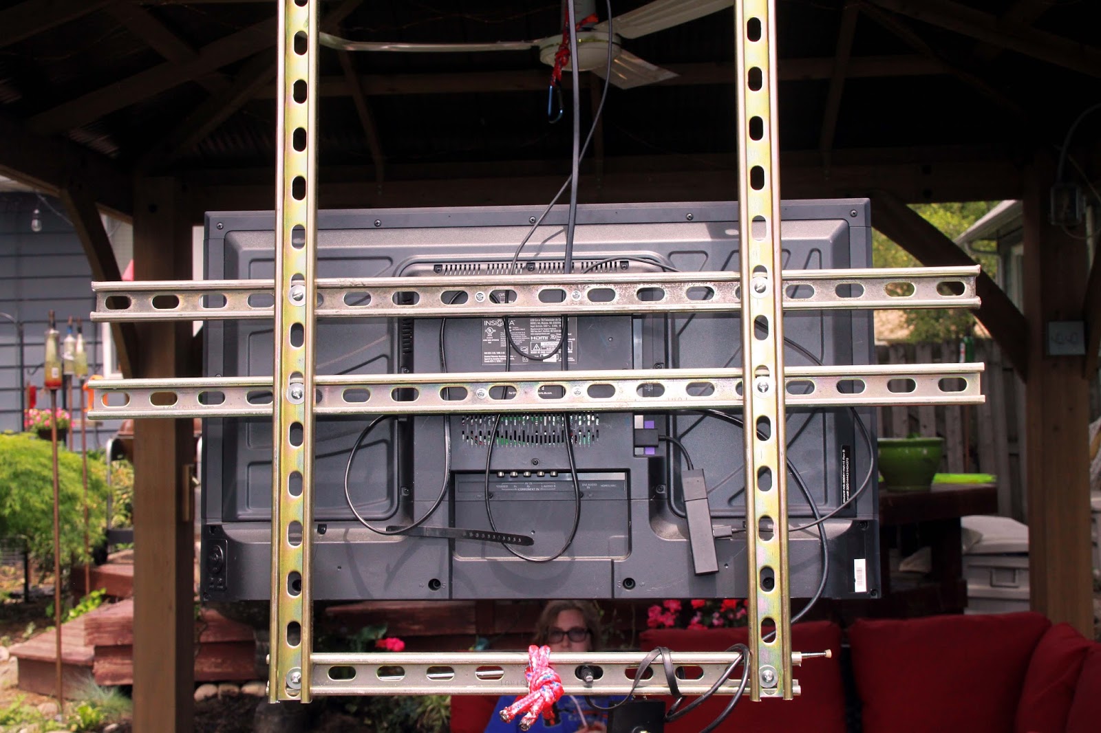 The Orange Door DIY Retractable System for a TV in a Gazebo