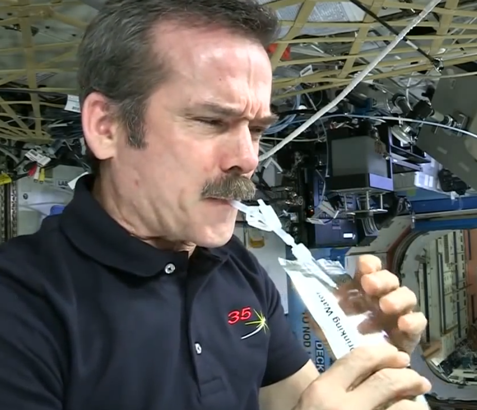Astronaut Drinking Water