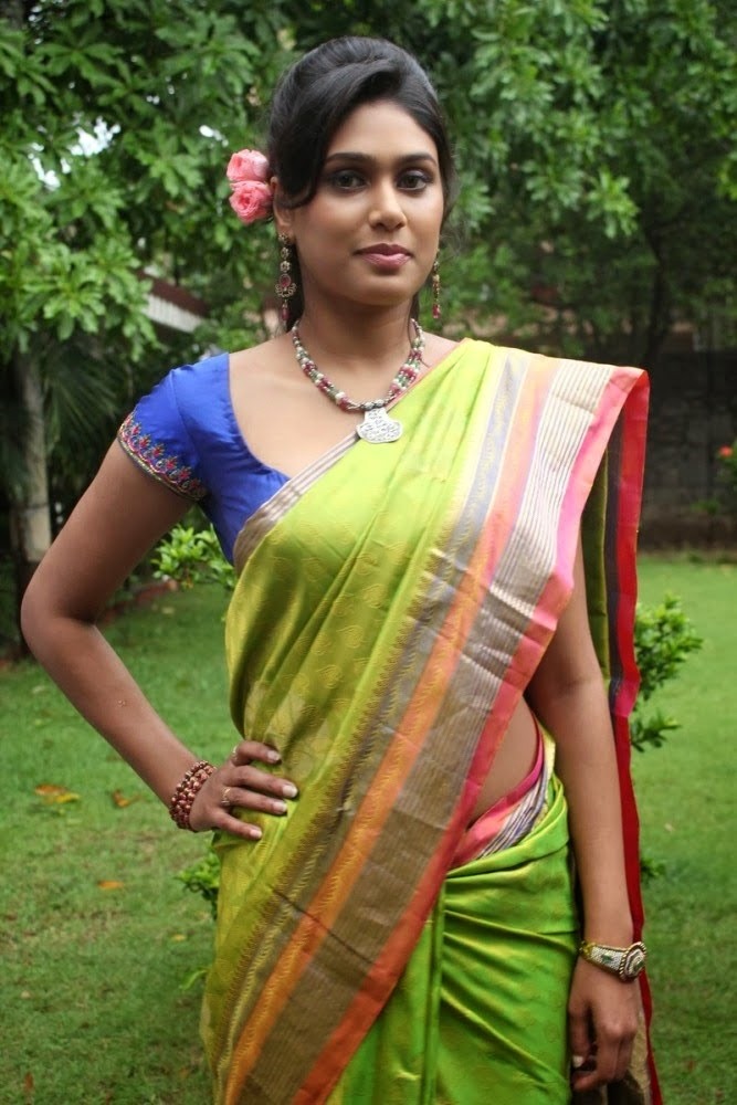Manisha Yadhav Spicy Stills in Hot Green Saree - CAP