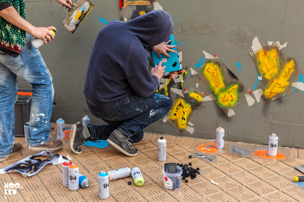 Street Artists OakOak and Jaune at work on a mural in Ostend, Belgium. Street Artists OakOak and Jaune at work on a mural in Ostend, Belgium. Photo ©Hookedblog / Mark Rigney