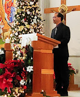 man standing at pulpit
