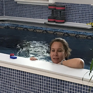 Endless Pools owner Kat T. in the Performance Endless Pool in her garage Endless Pools owner Kat T. in the Performance Endless Pool in her garage