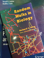 Random Walks in Biology, by Howard Berg, superimposed on the cover of Intermediate Physics for Medicine and Biology