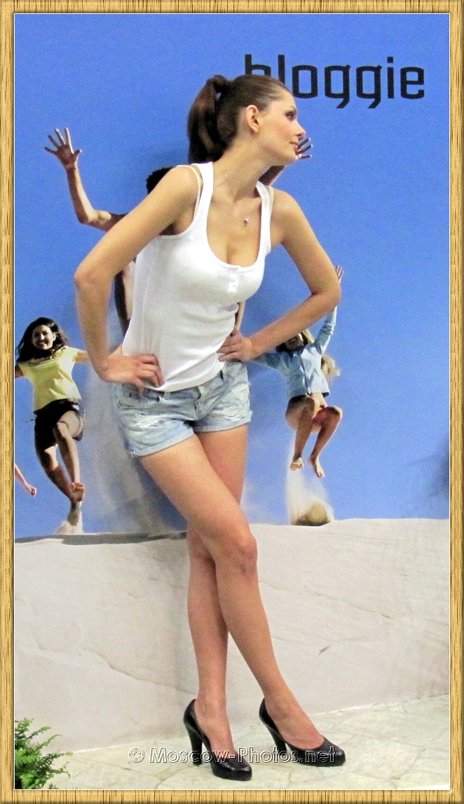  Model posing in vintage denim shorts 