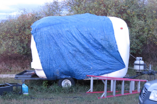 trailer covered with tarp