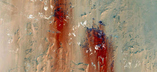 bloodstains on the wall of shame from the hands of a woman stoned to death by the barbarians always, pictures from the air from the deserts of Africa, Abstract Naturalism collection of Munimara pictures from the air from the deserts of Africa,Abstract Naturalism collection of Munimara