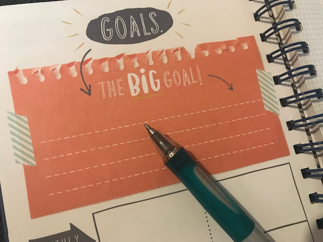 Page from a diary saying Goals and The big Goal