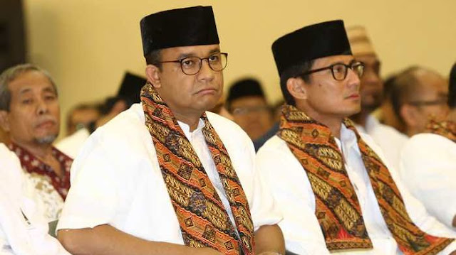 Anies-Sandi Terancam 18 Bulan Penjara Anies-Sandi Terancam 18 Bulan Penjara