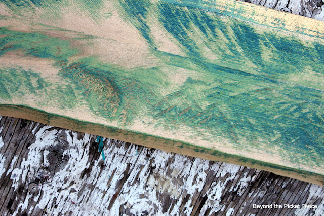 sand off paint to expose reclaimed wood