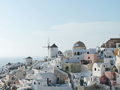 whitewashed view of Greek beach town