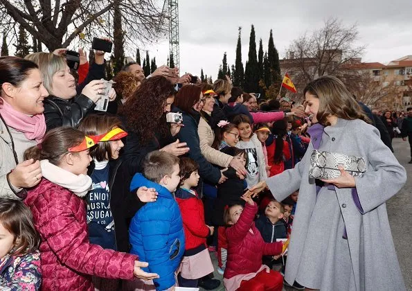 Queen Letizia wore Carolina Herrera coat and dress from Fall 2016 collection, carried Lidia Faro python skin clutch bag