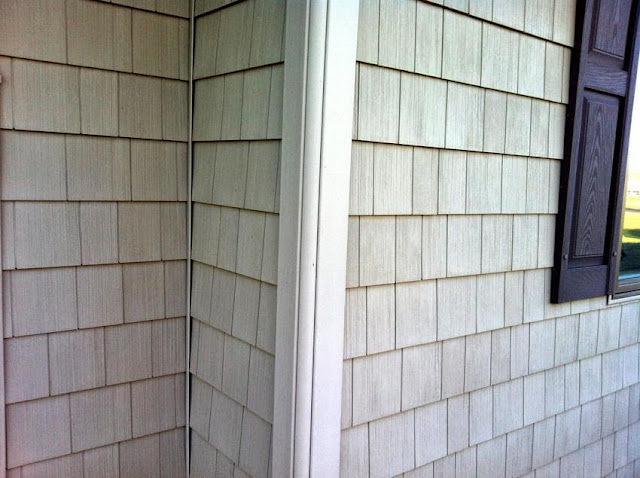 wood siding vs vinyl cost