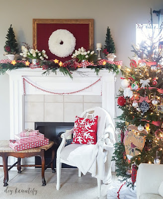 I'm sharing some tips for decorating a festive Christmas mantle sure to get you in the holiday spirit! See more at diy beautify!