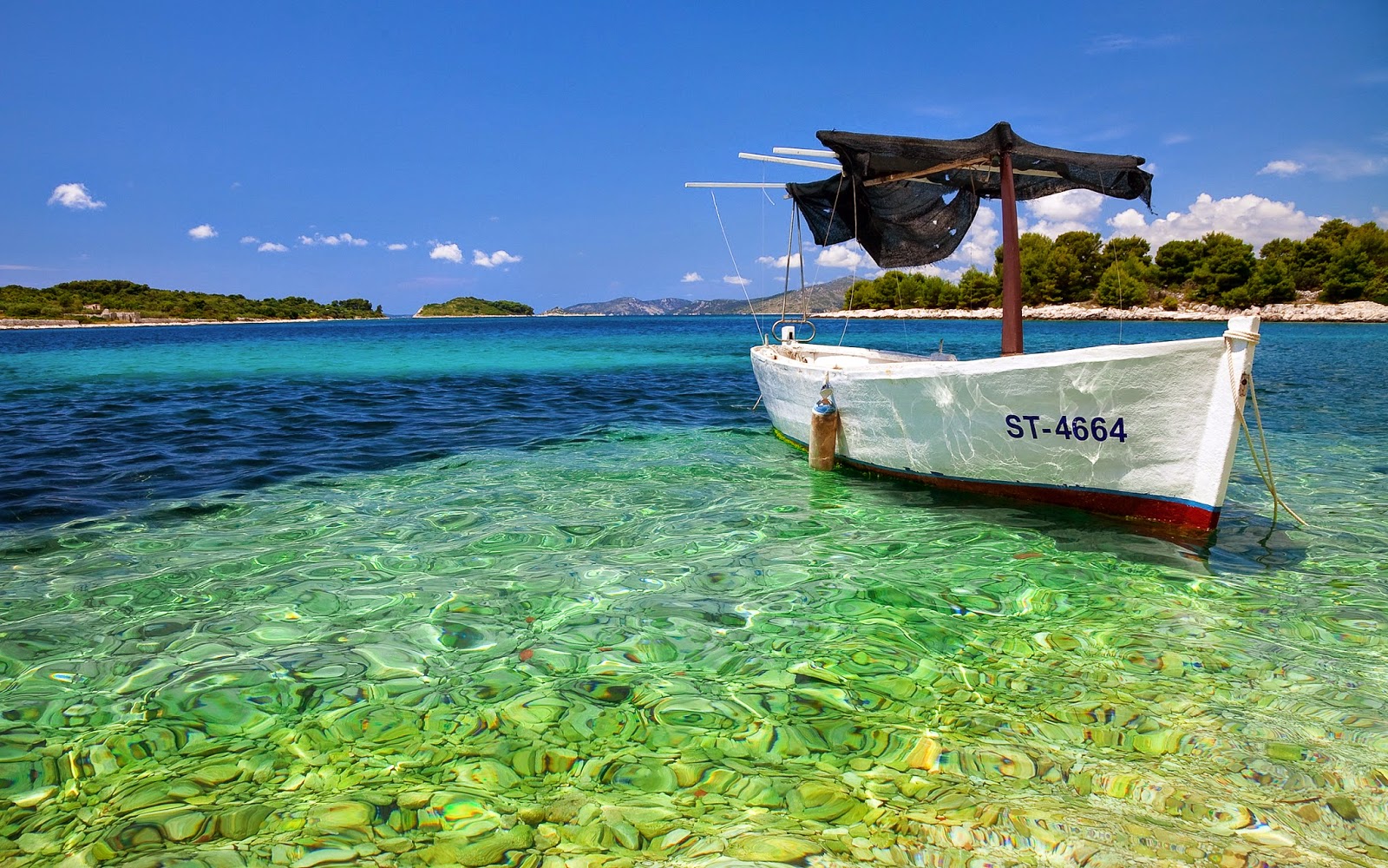 boat in pure water beach hd wallpaper image wallpaper theme