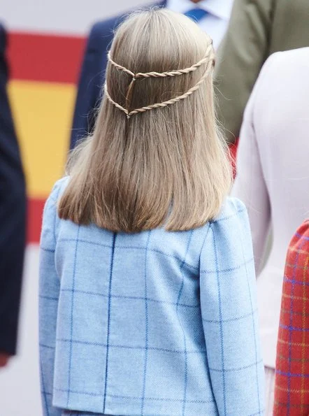 Queen Letizia wore Felipe Varela coat and dress. Crown Princess Leonor and Infanta Sofia attended National Day 2018 parade held at Plaza de Lima