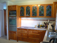 My "Magnolia"  leadlight panels in Cupboards set in New Guinea Rosewood