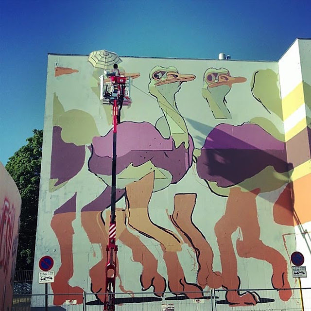 Spanish Street Artist Aryz at work on a new mural in Rennes For the Teenage kicks street art Festival.