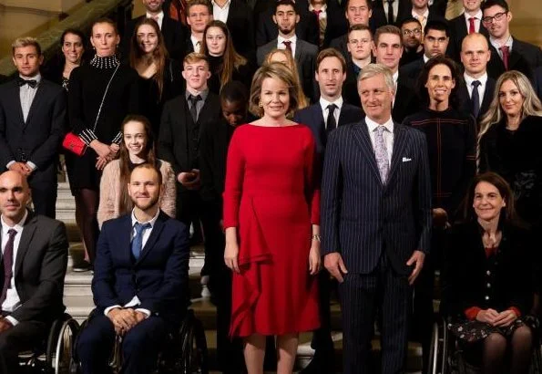 Queen Mathilde in a Natan dress. Red Dress by Natan for Queen Mathilde. Natan is a fashion house founded by Edouard Vermeulen