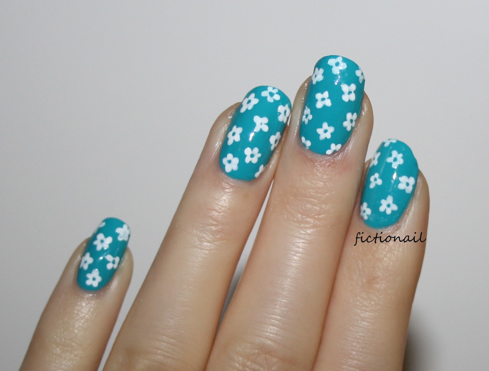 2. Simple corner flower nail design - wide 10