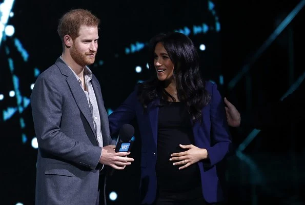 The Duchess of Sussex, Meghan Markle wore a new navy cashmere jacket by Ralph Lauren