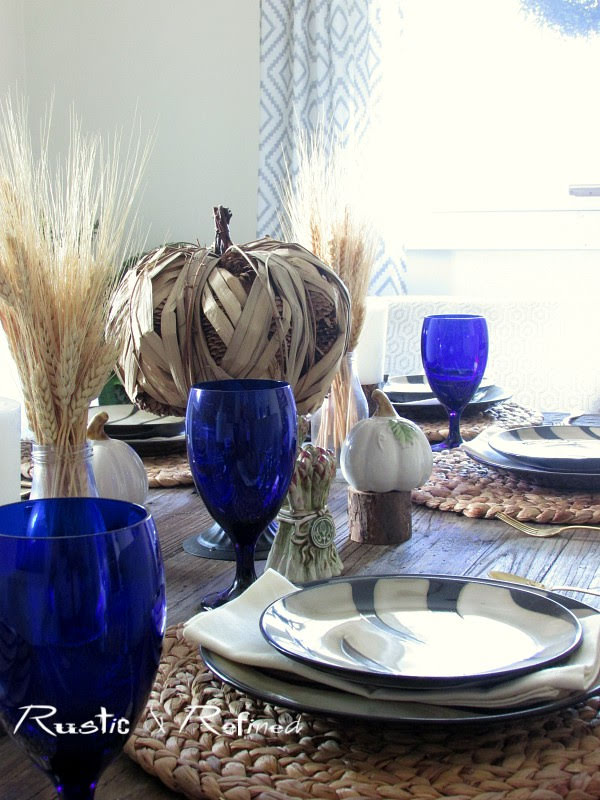 Quick and easy tablescape using zebra striped dishes for great fall texture.