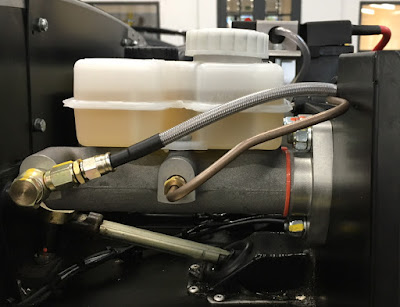 The upgraded A.P. Racing brake master cylinder