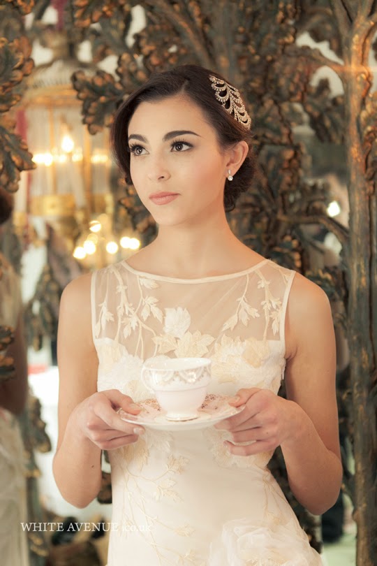 bride holding vintage teacup