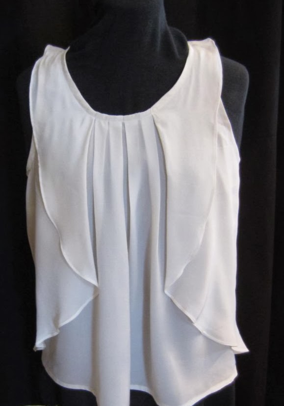 blusa sin manga con volantes