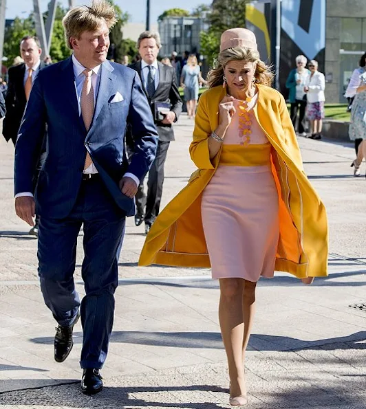 Queen Maxima wore Natan coat in yellow, wore Natan Dress in pink, Natan pumps, Natan clutch handbags, diamond earrings