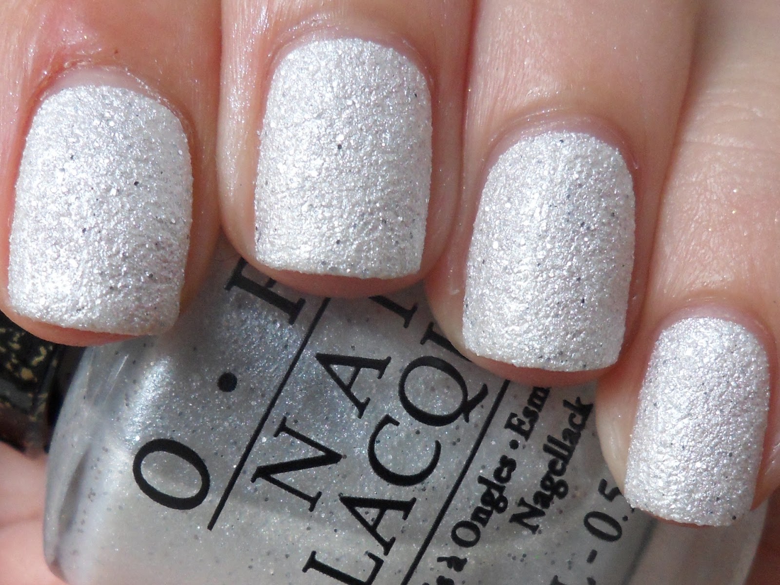 Silver nail polish with glitter