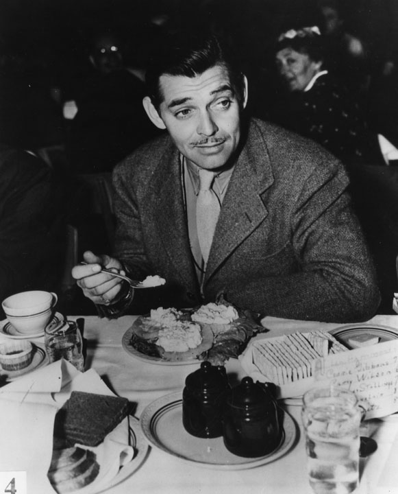 Clark Gable at the table
