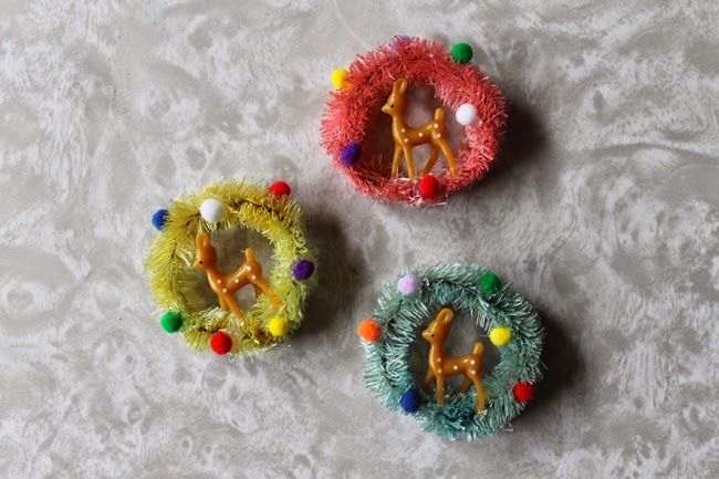 bottle brush novelty christmas brooches with miniature deer and pom poms from Wacky Tuna Vintage via Va Voom Vintage