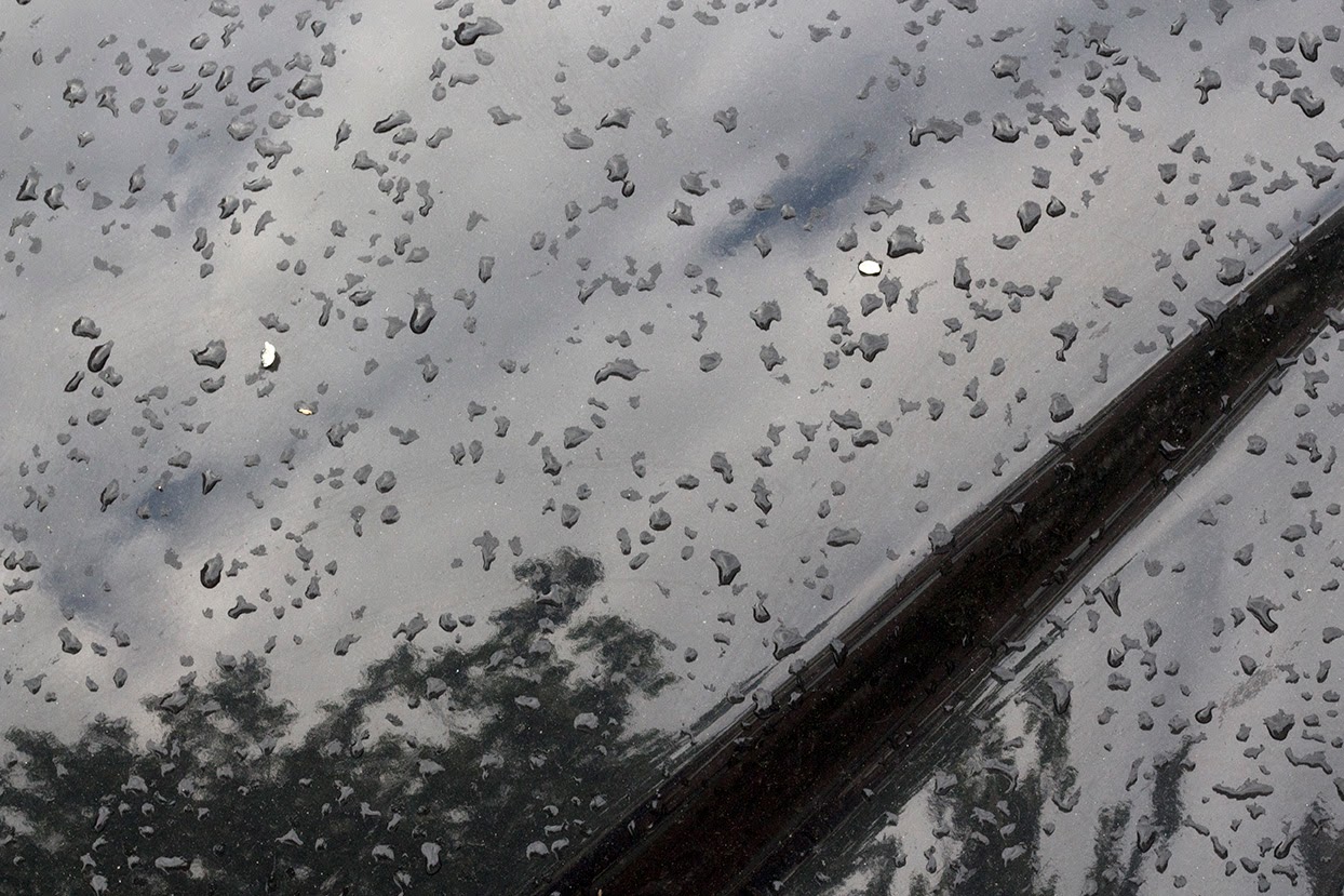 black car with raindrops