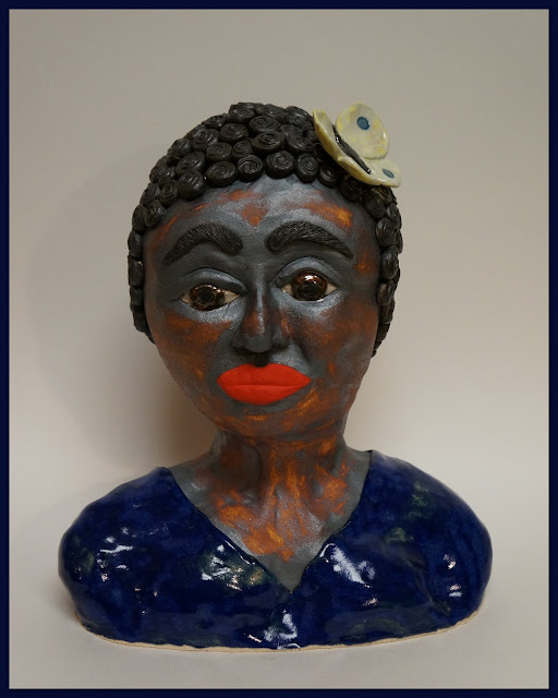 Beautiful negro woman ceramic sculpture by Lily L.