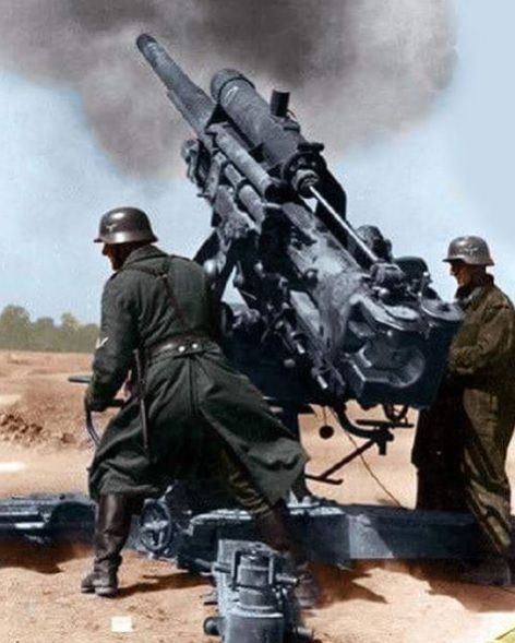 German 88mm gun firing color photos World War II worldwartwo.filminspector.com