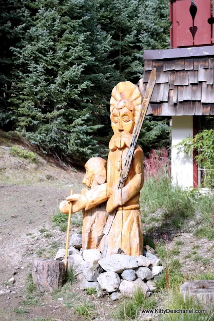 wooden statues at the taos ski valley