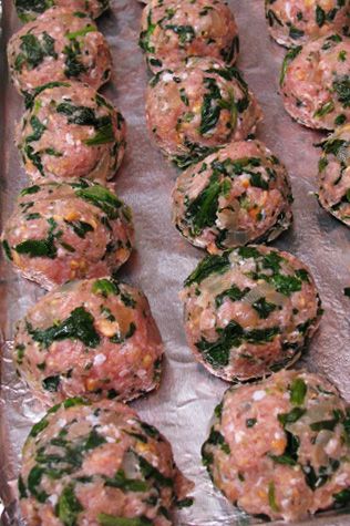Our children call these "Gramby Meatballs" because the recipe came from my dear mother-in-law. It's a great way to make spinach palatable. I usually make a triple batch, bake them all and freeze the extras for a quick meal later. —Mimi Blanco, Bronxville, New York