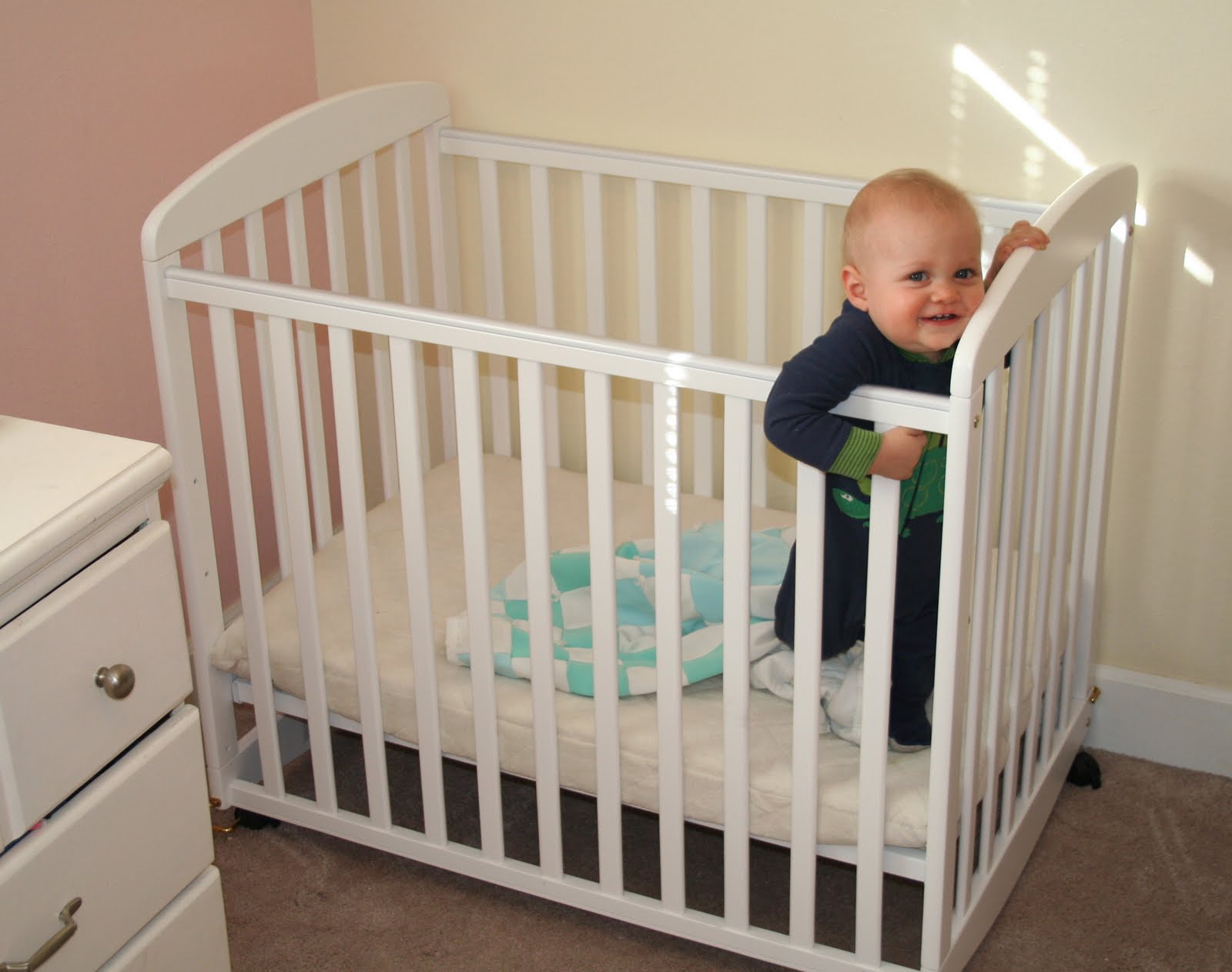 crib cover and small mattress