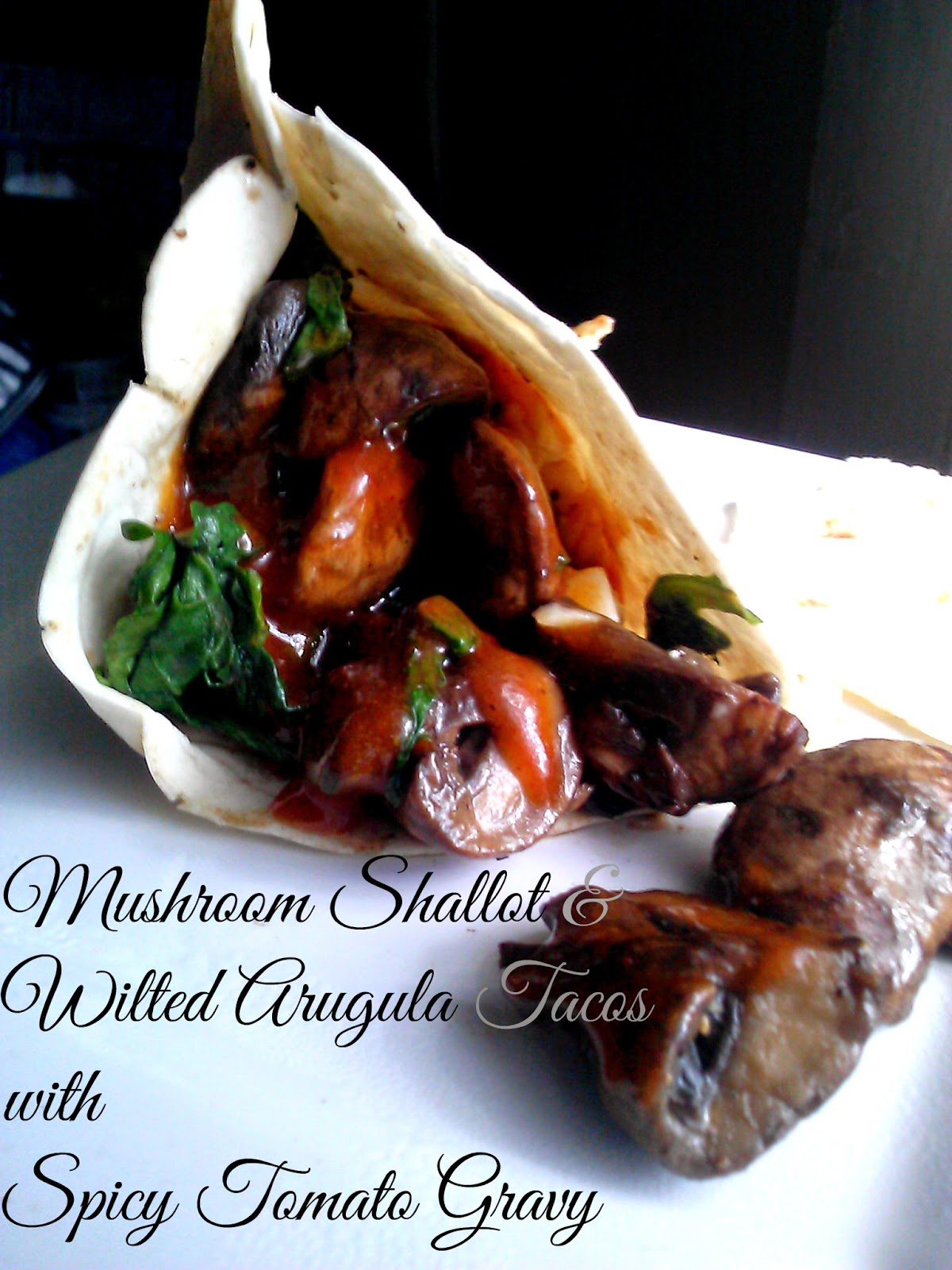 Mushroom, Shallot & Wilted Arugula Tacos with Spicy Tomato Gravy