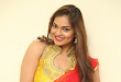 Aswini new sizzling pics in Red half saree