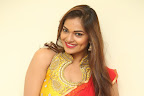 Aswini new sizzling pics in Red half saree-thumbnail-cover