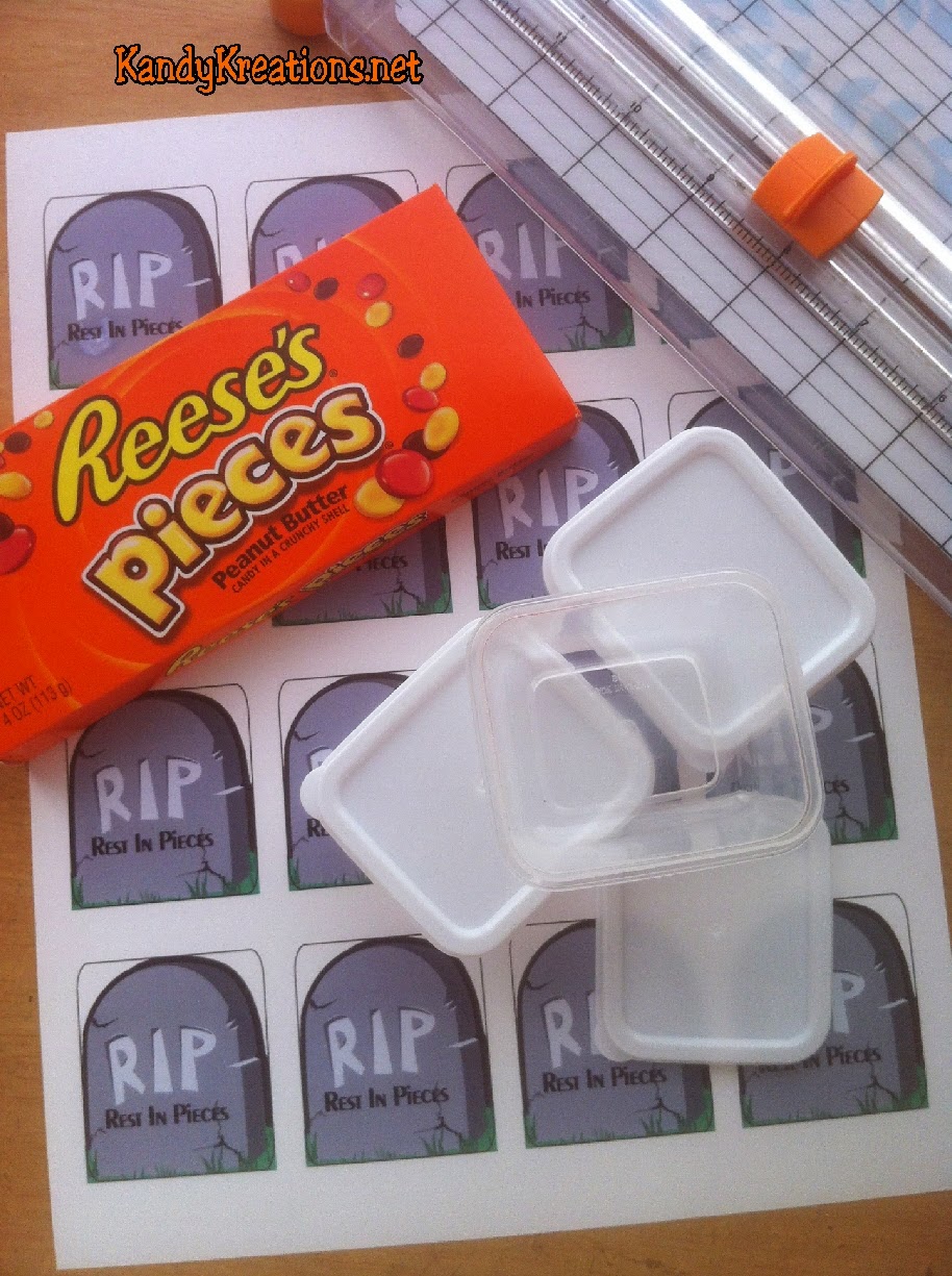 Celebrate with all your ghouls at your Halloween party using this Rest in Pieces candy box free printable.   You won't mind visiting your Halloween Tombstone when it's filled with Reeses Pieces candies and is so cheap and easy to make.