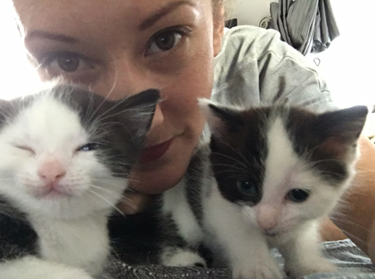 Frankie Seaman with two black and white kittens Frankie Seaman with two black and white kittens